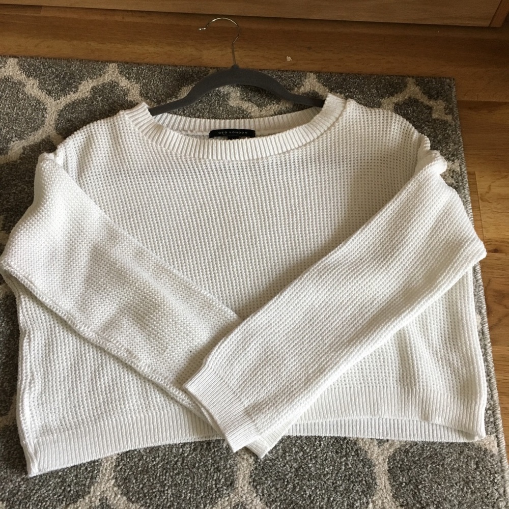 White cropped waffle sweater.